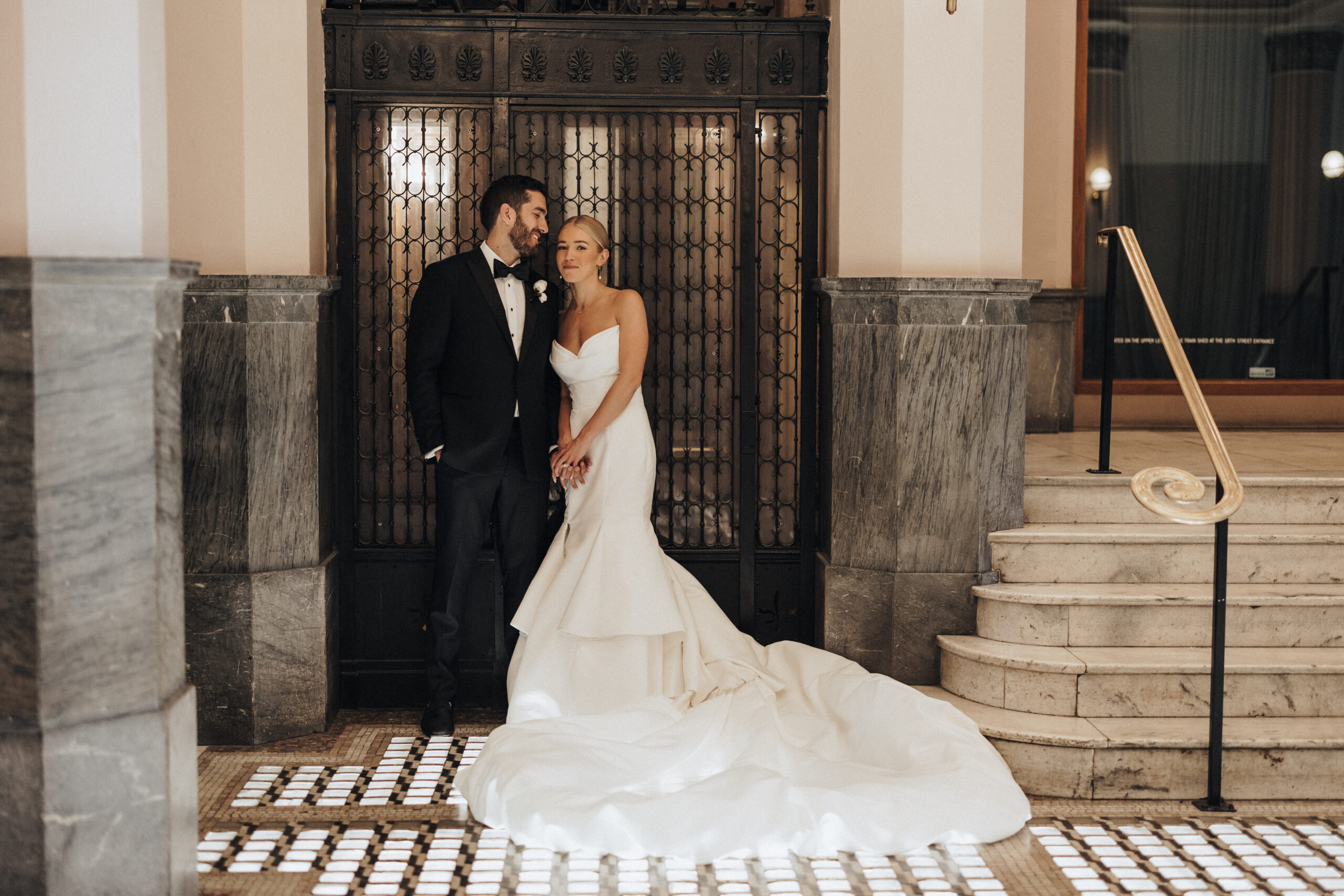 Couple posing at their STL Union Station wedding